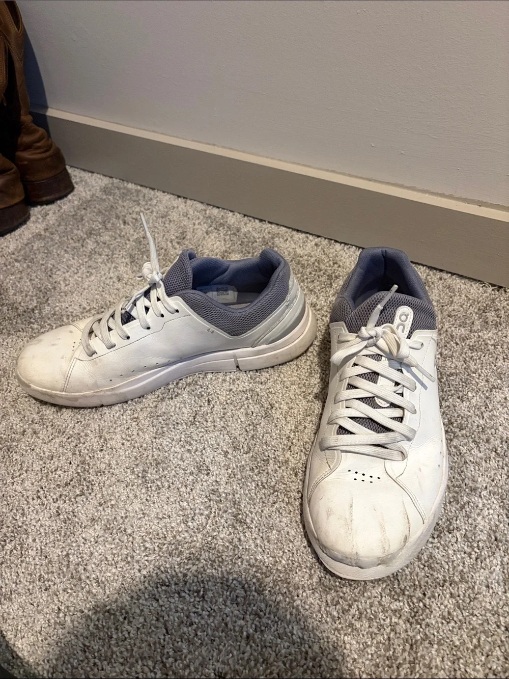 On Running “Roger” Sneaker. White and grey. Mens size 10.5. Used.